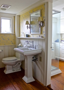 New England Style Guest Bathroom Is Divided Into Two Separate Parts