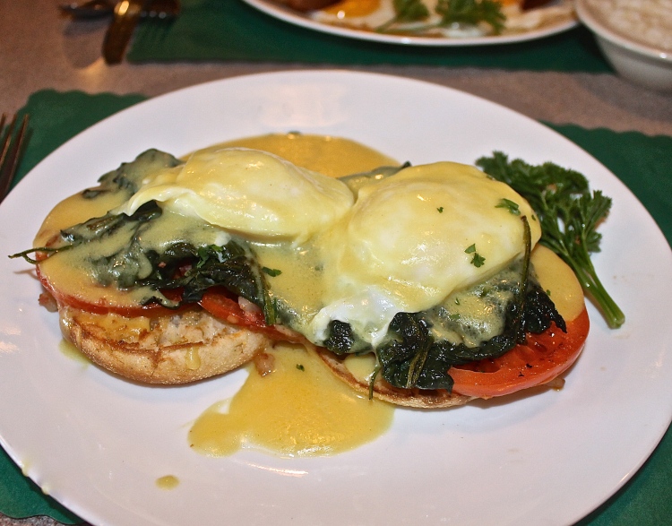 Florentine Eggs Benedict With Grilled Tomatoes, Sautéed Spinach And Hollandaise Sauce