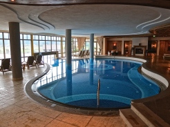 The Indoor Pool Is Connected To The Outdoor Pool